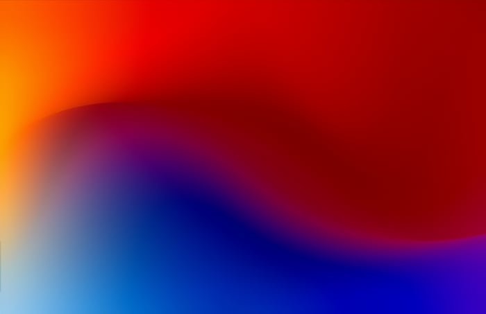 Abstract gradient of red, orange, blue, and purple.