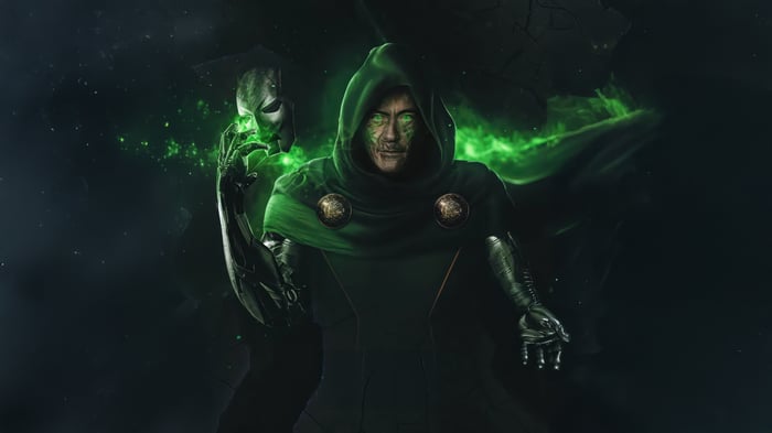 Doctor Doom holding a mask with green energy