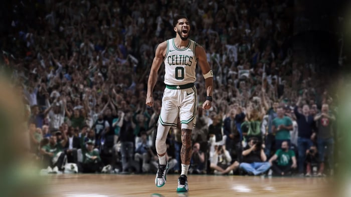 Jayson Tatum celebrates on the court