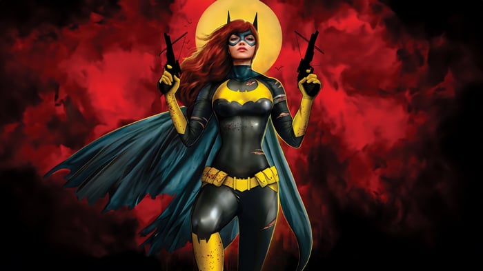 Batgirl holding two guns in front of a red moon