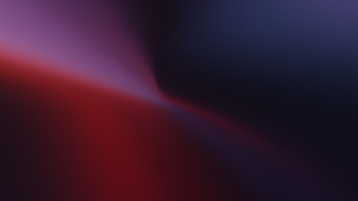 Abstract gradient with red, purple, and dark blue hues