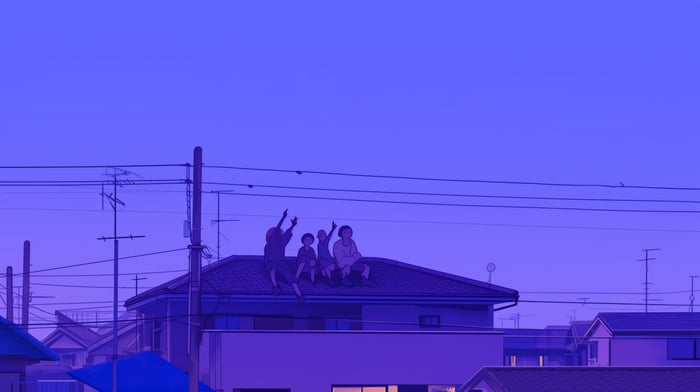 People on a rooftop at dusk