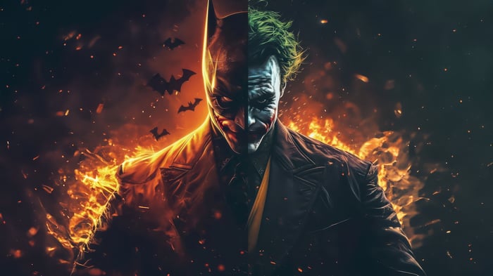 Batman and Joker split face with fire and bats