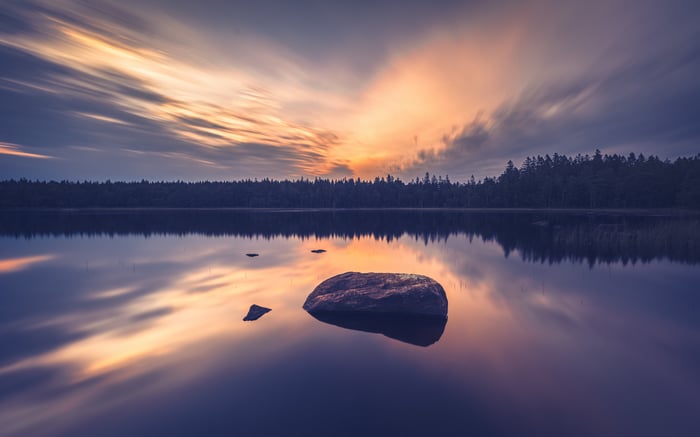 Long Exposure Lake Sunrise with Rocks