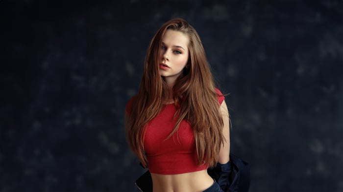Girl with long brown hair and blue eyes