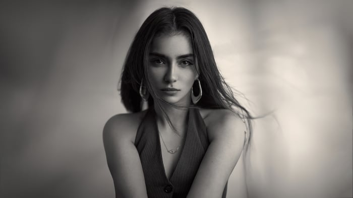 Monochrome portrait of a girl with hoop earrings