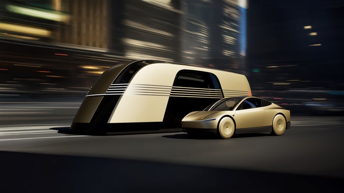 Tesla Robotaxi X Robovan on a city street