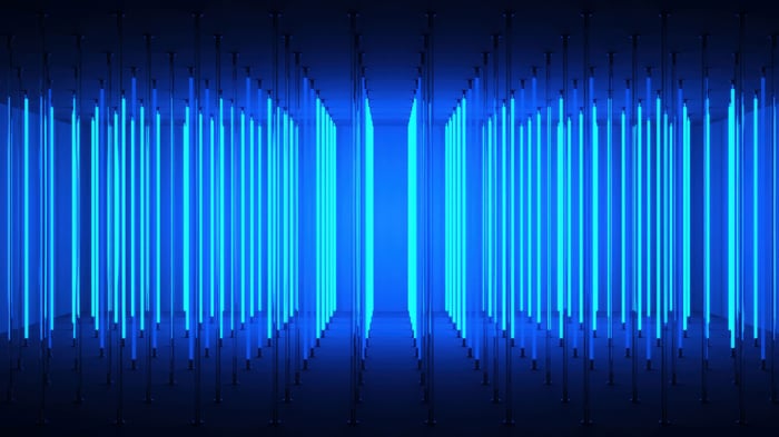 Abstract blue neon lights in a dark room