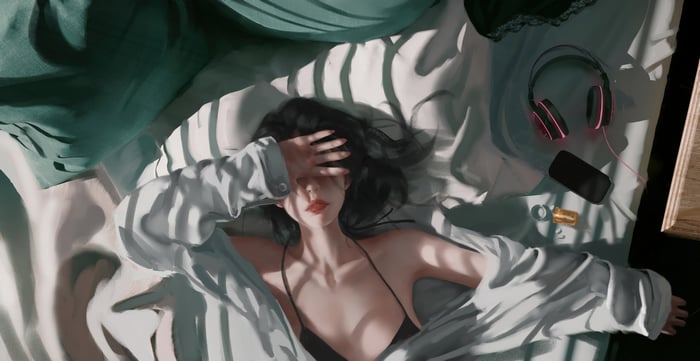 Woman Lying Down with Hand Over Eyes