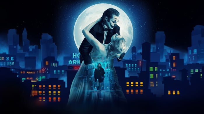 Joker and Harley Quinn dancing under the moon