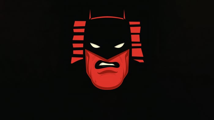 Batman's stylized red and black face