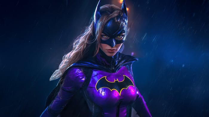 Batgirl in a purple and black suit