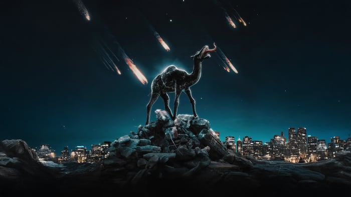 A camel stands on rocks with meteors falling
