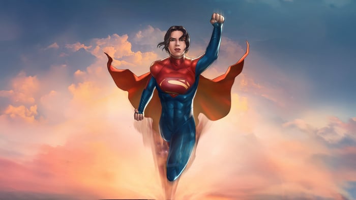 Supergirl flying through the sky at sunset