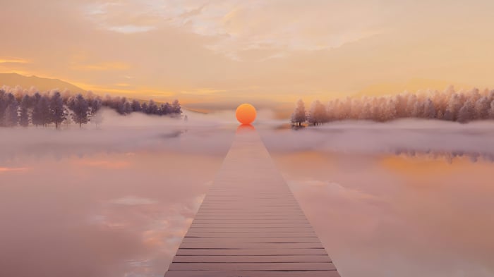 Wooden Pier Leading to Orange Sun Over Misty Lake