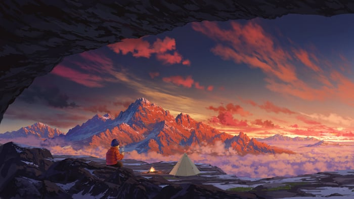 Person camping in mountains at sunset