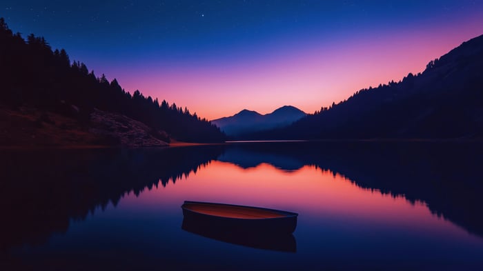 Boat on a lake at sunset with mountains