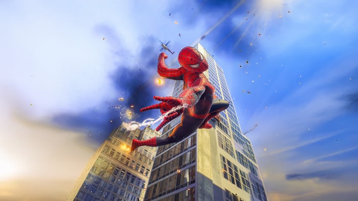 Spider-Man in action with skyscrapers and helicopter
