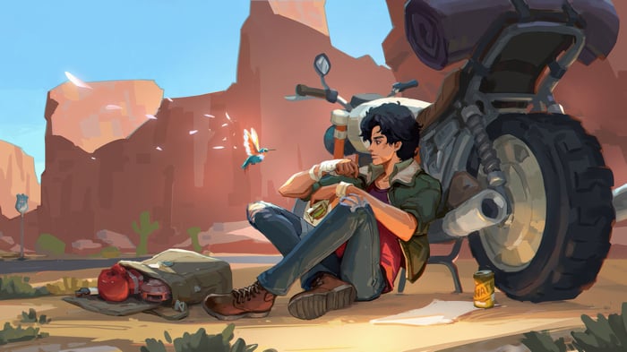 Man with motorcycle in a desert landscape