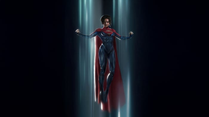 Sasha Calle as Supergirl in a blue and red suit