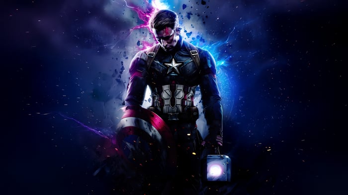 Captain America holding Mjolnir and his shield
