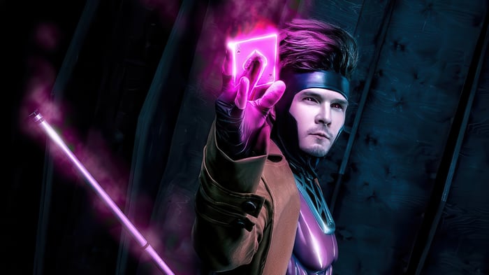 Gambit holding a glowing ace of spades card
