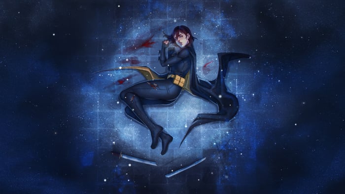Batwoman lying injured on the ground