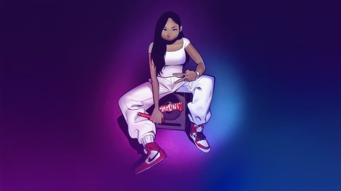 Girl sitting on a speaker with a microphone
