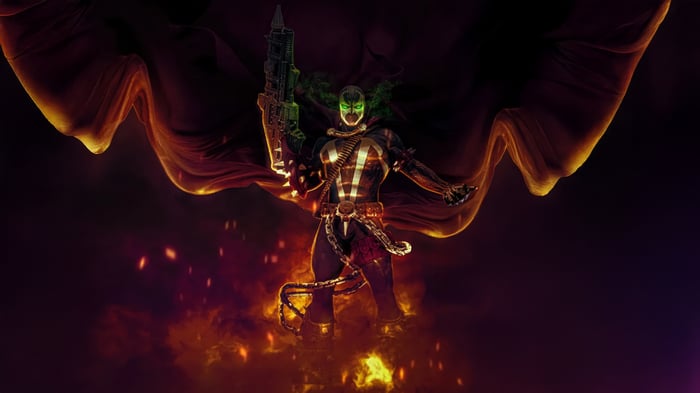 Spawn holding a gun with a cape