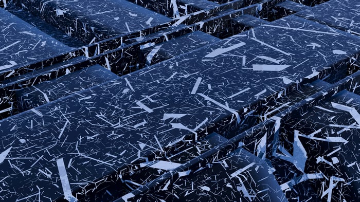 Blue and black surface with white abstract patterns