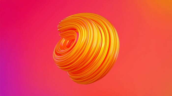Orange and yellow spiral twist on pink and purple background