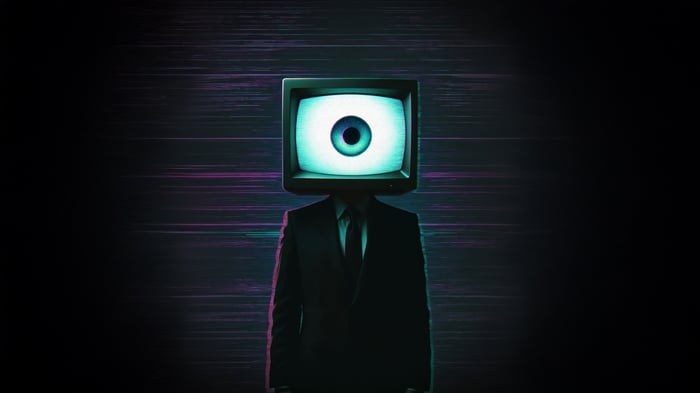 Man in Suit with Television Head Displaying an Eye