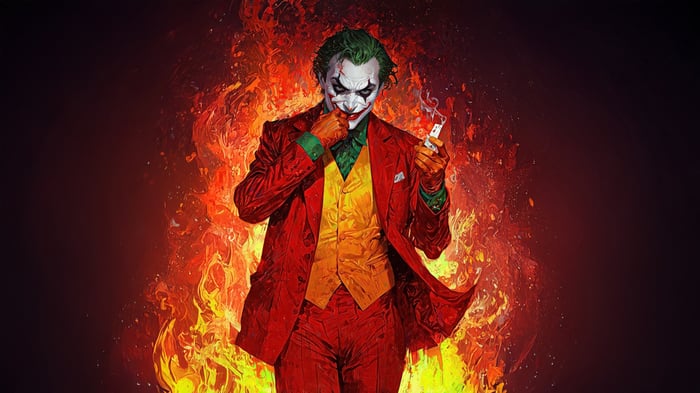 Joker standing in front of flames