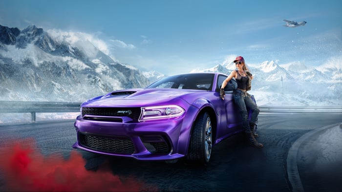 Dodge Charger SRT Hellcat Widebody with a woman and mountains