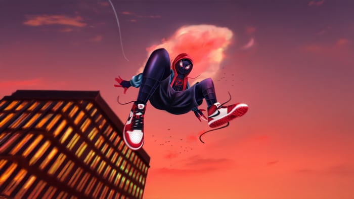 Miles Morales swinging through the city at sunset