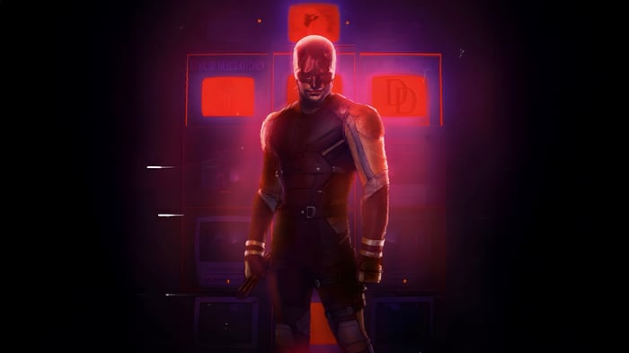 Daredevil in a dark room with red screens
