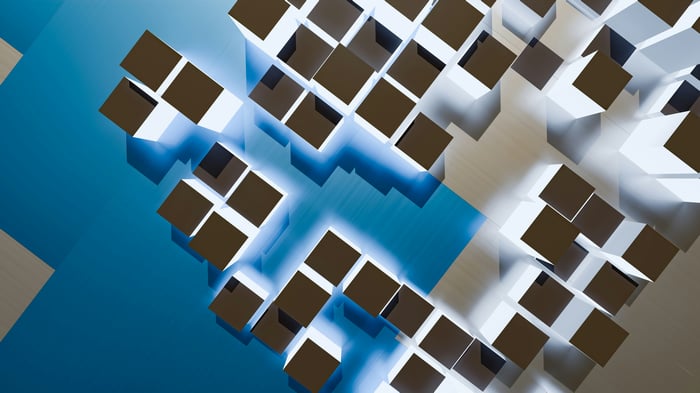 Abstract geometric pattern of cubes with blue lighting