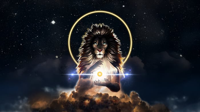 Lion with a glowing orb in the night sky
