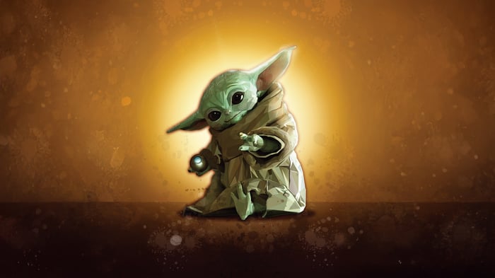 Grogu holding a glowing orb
