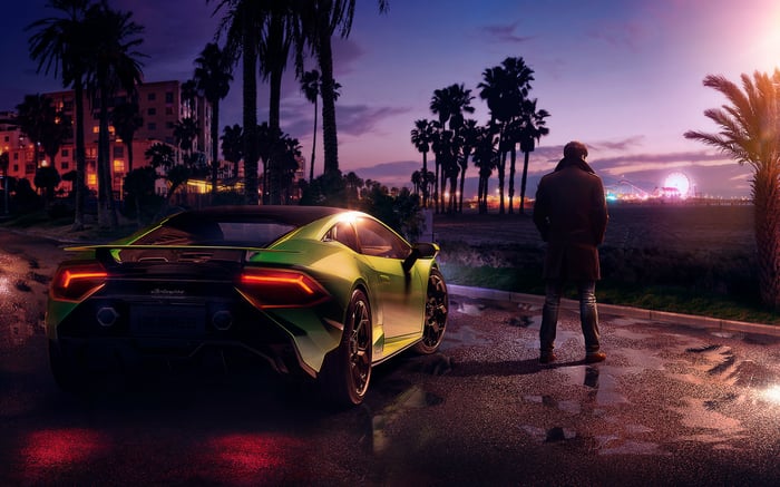 Lamborghini at Twilight with a Man and Ferris Wheel