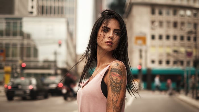 Tattooed Woman on a City Street