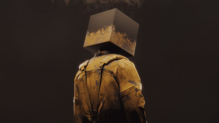 The Box Head character in a yellow coat