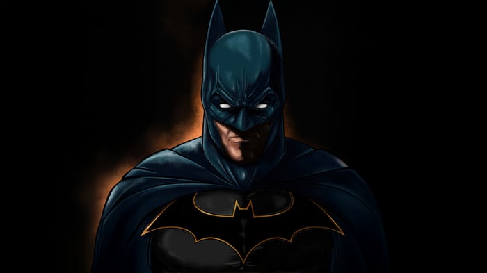 Batman in Dark Blue Suit with Gold Bat Symbol