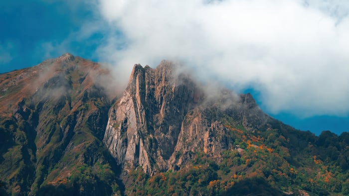 Clouds over rugged mountain peaks