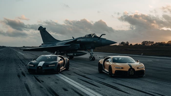 Bugatti Chirons and Fighter Jet on Runway