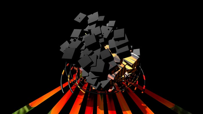 Black Cubes Exploding from a Wireframe Structure