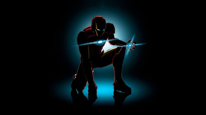 Iron Man in a crouched pose with glowing repulsors