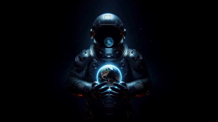 Astronaut holding Earth in space