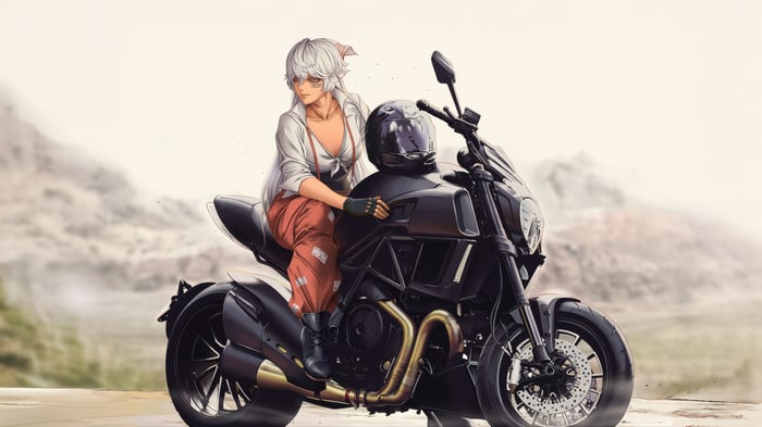 Woman on a motorcycle with mountains in the background