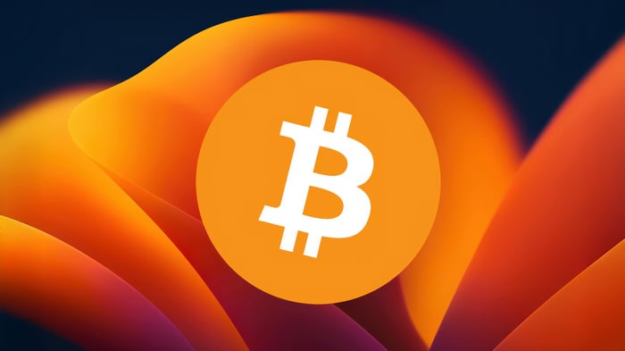 Bitcoin Logo on Abstract Orange and Blue Background